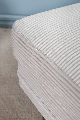 Boom Ottoman - Mässing / Beige Manchester